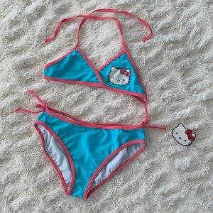 2523.NWOT Hello Kitty swimsuit set